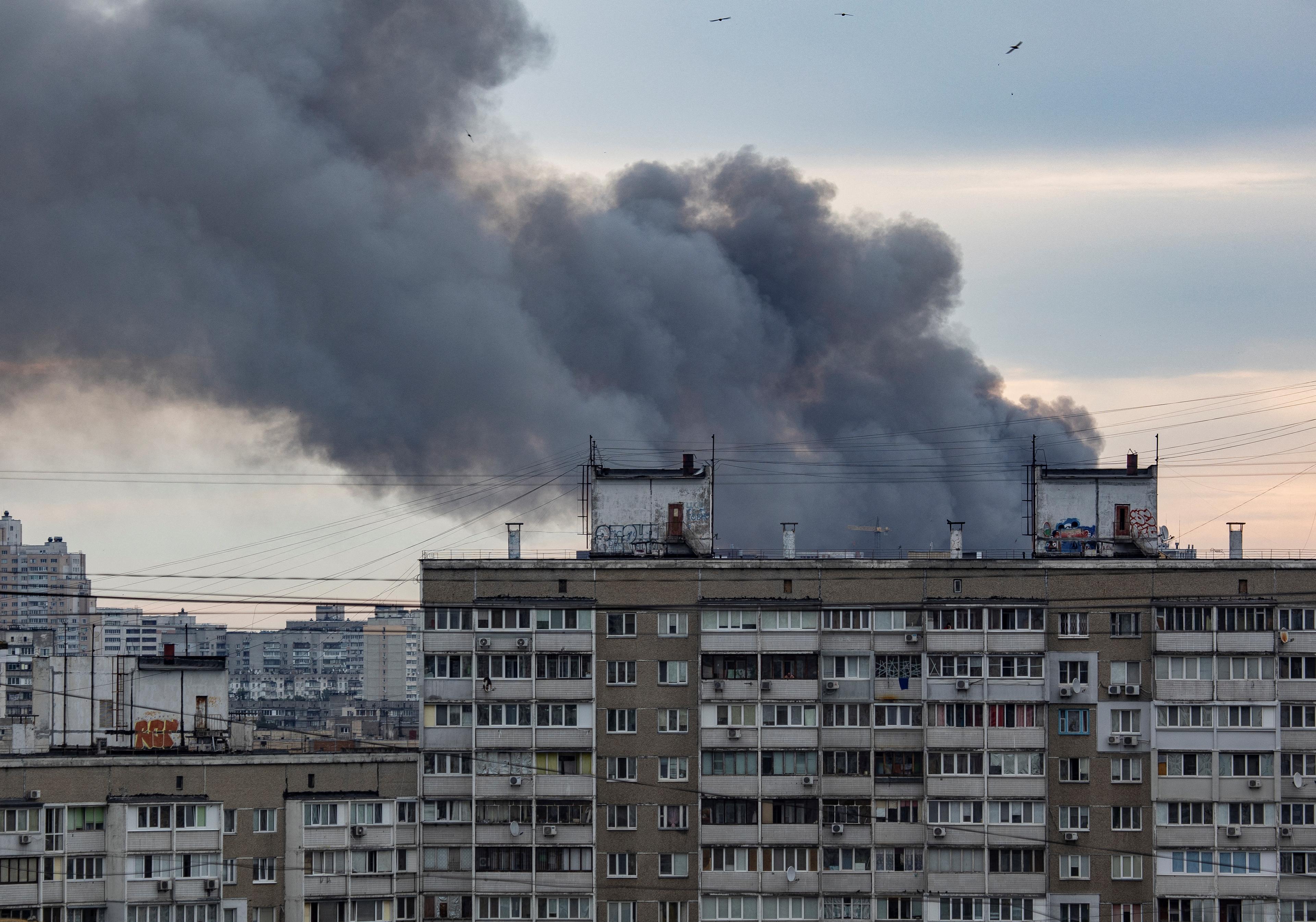 Russian soldiers conduct a missile strike on Kyiv