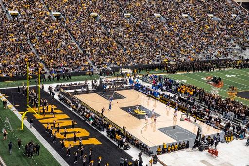 Clark's triple-double highlights game at Kinnick. Women's basketball record crowd of 55,646 shows up
