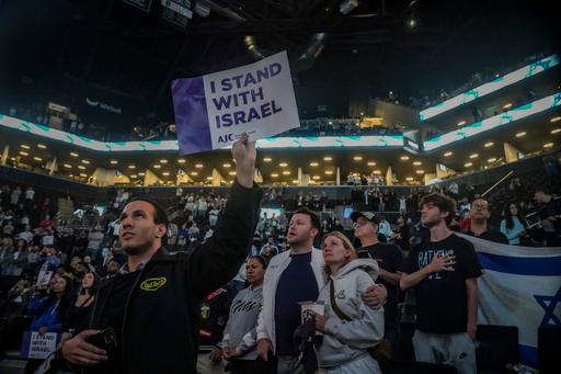 An Israeli team begins a tour against NBA teams, believing games provide hope during a war at home